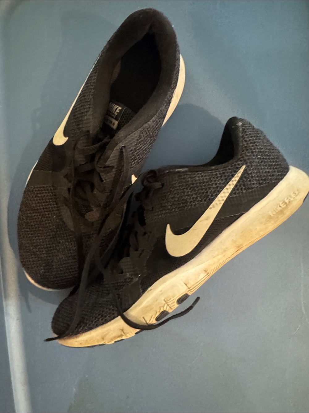 Nike Black Running Sneakers with White Swoosh